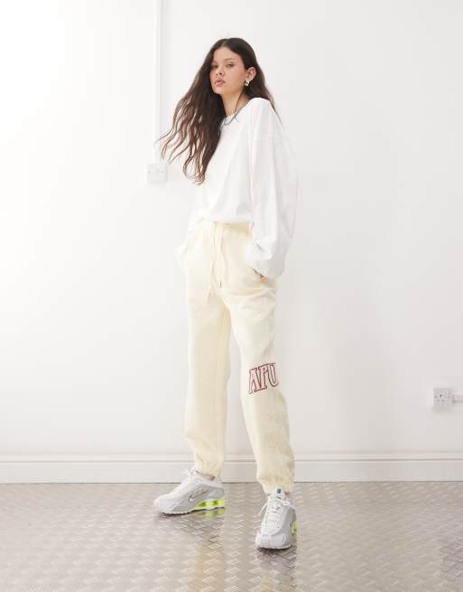 AAPE By A Bathing Ape - Joggers color avorio in pile francese 