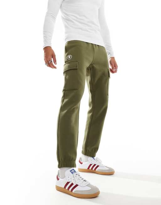 AAPE By A Bathing Ape - Kakifarvede cargo-joggingbukser med tætsiddende buksekanter og logo