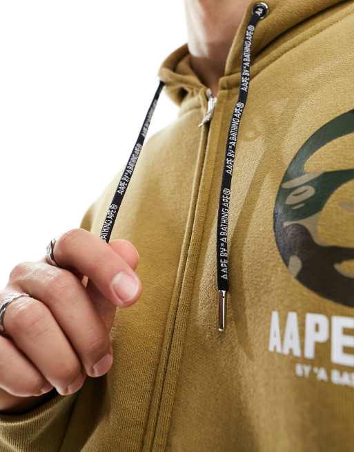 AAPE by A Bathing Ape – Kapuzenpullover in Khaki mit Knochenprint in X-Form  am Rücken