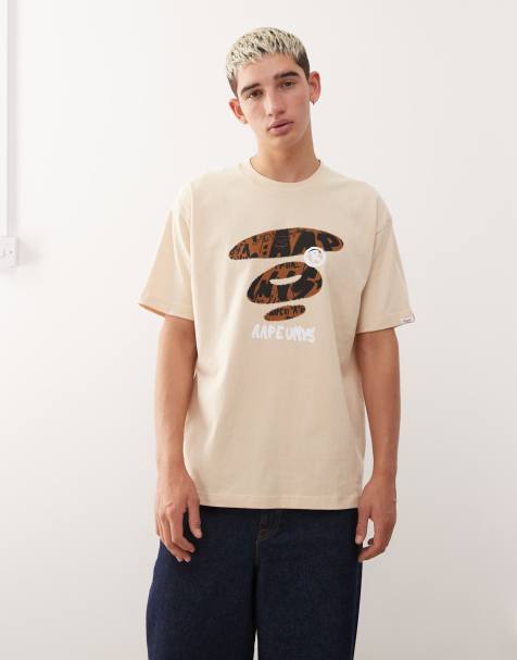 AAPE BY A BATHING APE® – Kastiges T-Shirt in Beige mit Logoprint auf der Vorderseite - view 1