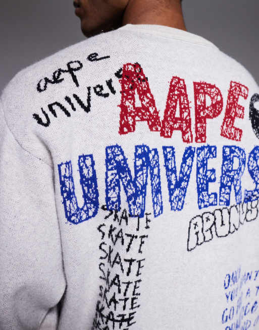 Aape by A Bathing Ape knitted sweater in off white with placement scribble print