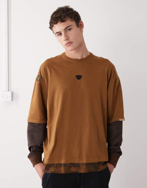 AAPE BY A BATHING APE® – Langärmliges, doppellagiges Oversize-T-Shirt in Braun mit Military-Muster-Einsatz - view 1