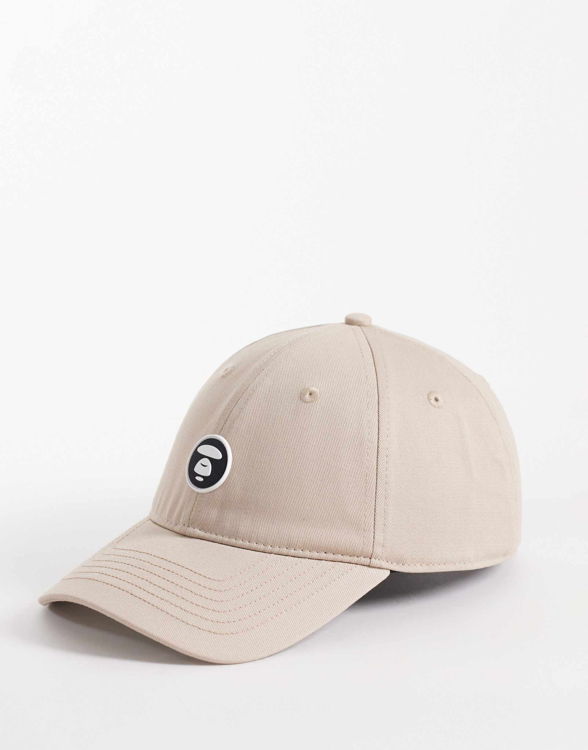aape by a bathing ape logo baseball cap in beige