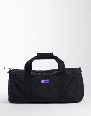 AAPE BY A BATHING APE® Aape by A Bathing Ape logo duffle bag in black