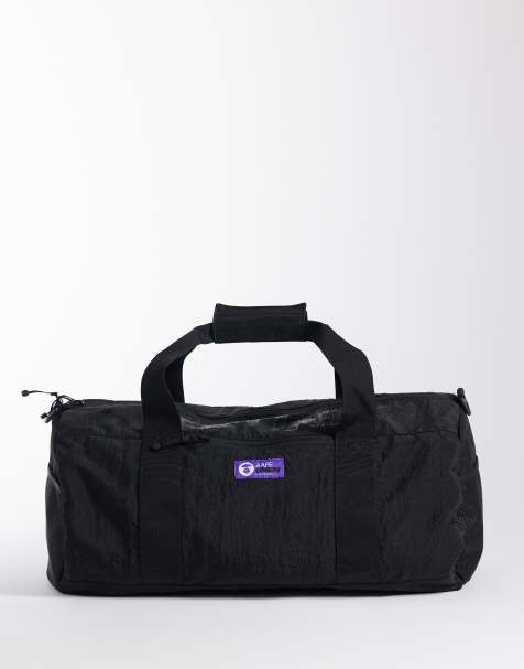 Aape by A Bathing Ape logo duffle bag in black - view 1