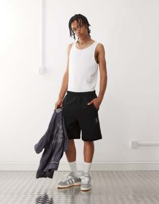 AAPE BY A BATHING APE® Aape by A Bathing Ape logo sweatshirt fabric shorts in black
