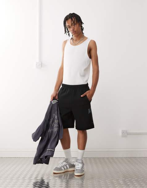 Aape by A Bathing Ape logo sweatshirt fabric shorts in black - view 1