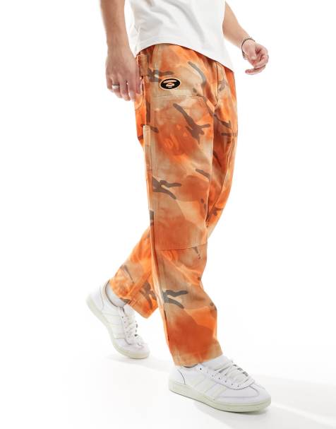 AAPE By A Bathing Ape loose fit camo jeans in orange - view 1