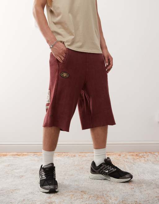 Aape by A Bathing Ape loose fit heavyweight knit shorts in dark burgundy with embroidered side stripe