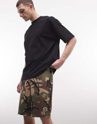 Трикотажные шорты свободного кроя Aape by A Bathing Ape в камуфляжной расцветке.