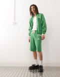 [AAPE BY A BATHING APE®] Aape by A Bathing Ape loose fit knitted shorts with college logo in green (Part of a set) M GREEN