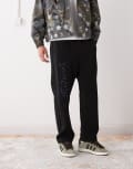 [AAPE BY A BATHING APE®] Aape by A Bathing Ape loose fit trackies in black with leg embroidery M BLACK