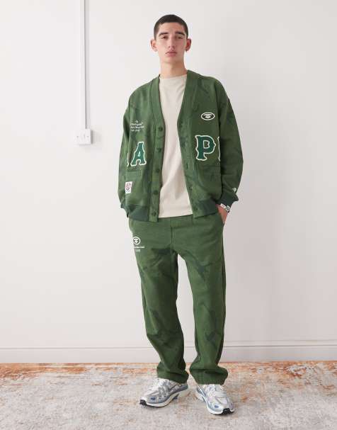 Aape by A Bathing Ape loose fit trackies in dark green camo - view 1