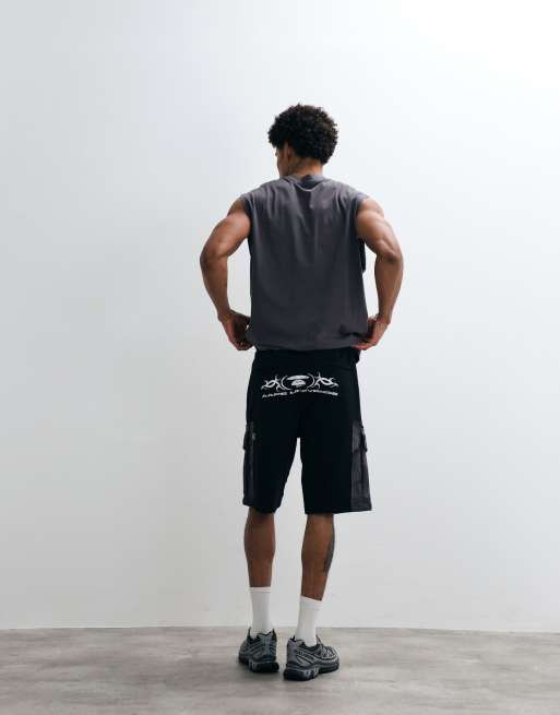 AAPE BY A BATHING APE løstsiddende jersey-motocrossshorts i sort med camouflagelommer, 4 af 5