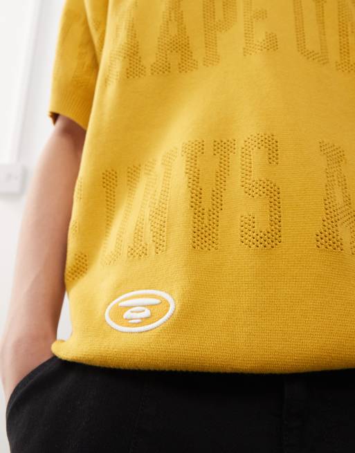 Aape by A Bathing Ape monogram logo knit polo shirt in mustard yellow, 2 of 4