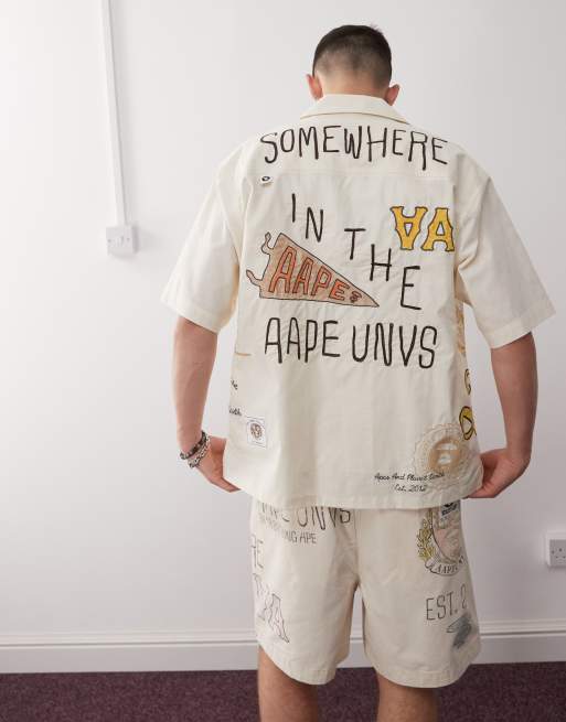 Aape by A Bathing Ape multi logo college short sleeve shirt in beige, 2 of 4