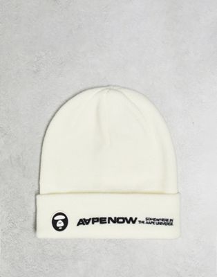 Aape by A Bathing Ape now beanie in off white with logo embroidery and badge