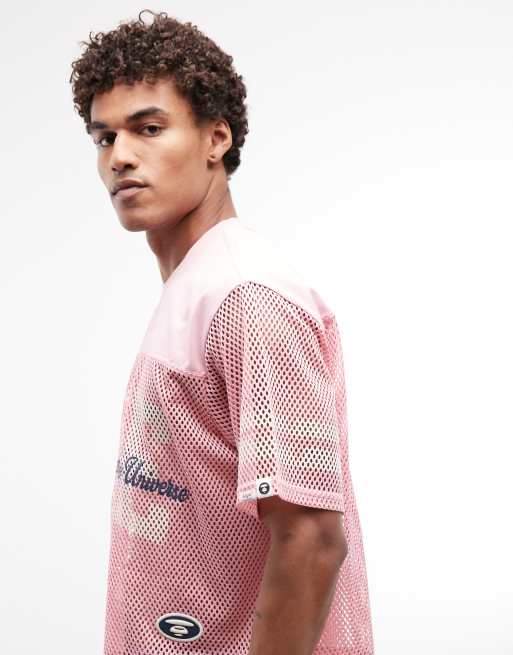Aape by A Bathing Ape oversized mesh jersey top in pink with multi logo prints, 5 of 5