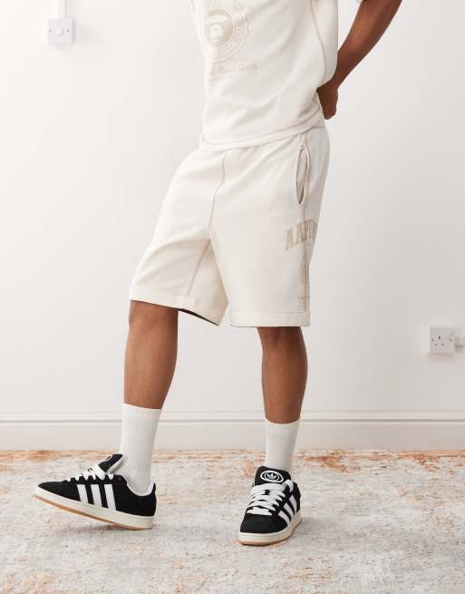 Aape by A Bathing Ape reversible logo sweat shorts in off white, 2 of 5