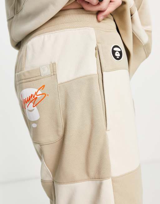 AAPE By A Bathing Ape rock climber patch sweat shorts in beige | ASOS