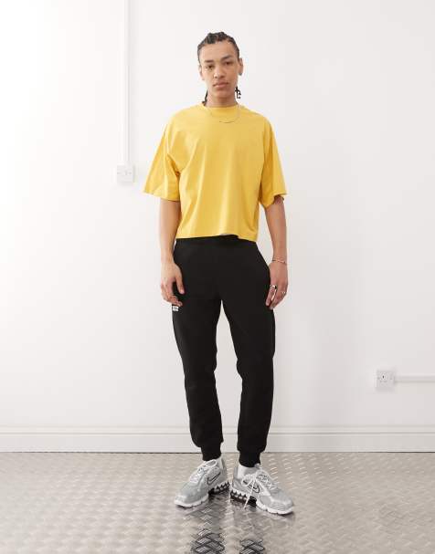 Aape By A Bathing Ape side logo cuffed sweatpants in black - view 1