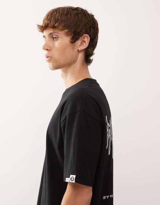 Aape by A Bathing Ape – Svart t-shirt med boxig passform, tryck och logga, 4 av 5