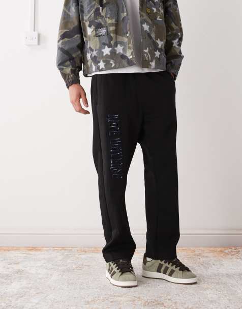 Aape By A Bathing Ape – Svarta, lediga mjukisbyxor med broderi på benet - view 1