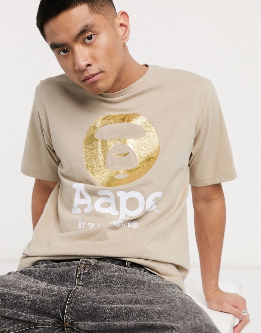 AAPE By A Bathing Ape - T-shirt beige con logo a testa-Cuoio