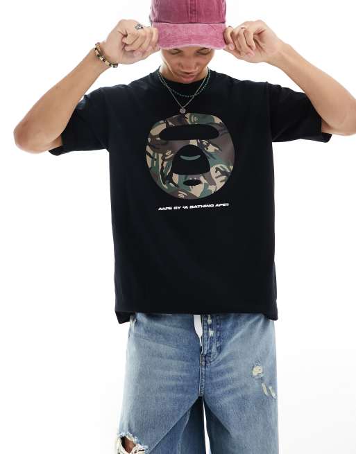 AAPE By A Bathing Ape® - T-shirt coupe carrée à manches courtes avec imprimé camouflage à l'avant - Noir
