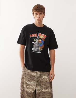 Aape by A Bathing Ape - T-shirt coupe carre avec imprim btiment sur le devant - Aape By A Bathing Ape - Modalova