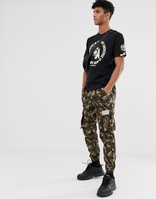 black shirt camo pants