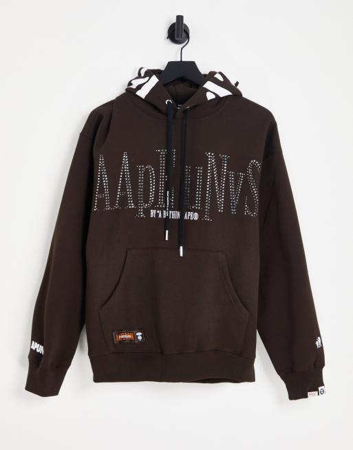 AAPE by A Bathing Ape universe oversize hoodie in off brown | ASOS