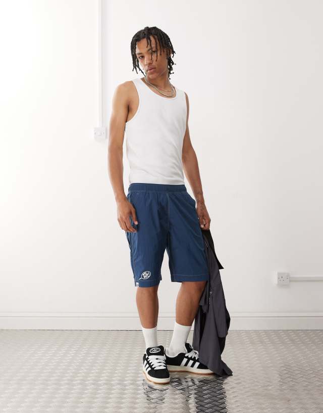 Aape by A Bathing Ape worker carpenter shorts in navy | ASOS