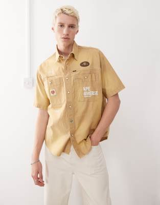 AAPE BY A BATHING APE® Aape by A Bathing Ape worker short sleeve shirt in beige with back embroidery-Neutral