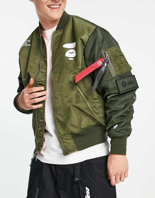 AAPE By A Bathing Ape x Alpha Industries – Kakigrön bomberjacka med vändbar design