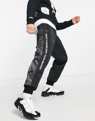 AAPE By A Bathing Ape x Alpha Industries quilted pants in black
