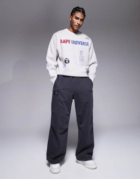 Aape by A Bathing Ape x Erased loose fit heavyweight jersey sweatpants in washed black - view 1