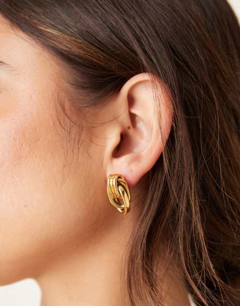 Abbott Lyon statement knot stud earrings in 18k gold plated waterproof stainless steel - view 1