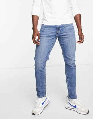 Abercrombie & Fitch athletic skinny fit jeans in mid wash