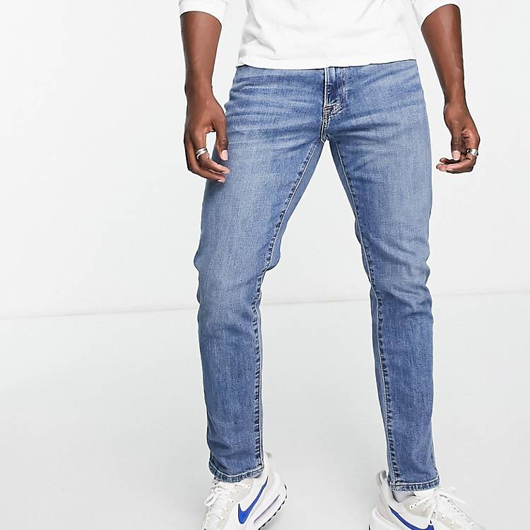 Abercrombie & Fitch athletic skinny fit jeans in mid wash | ASOS