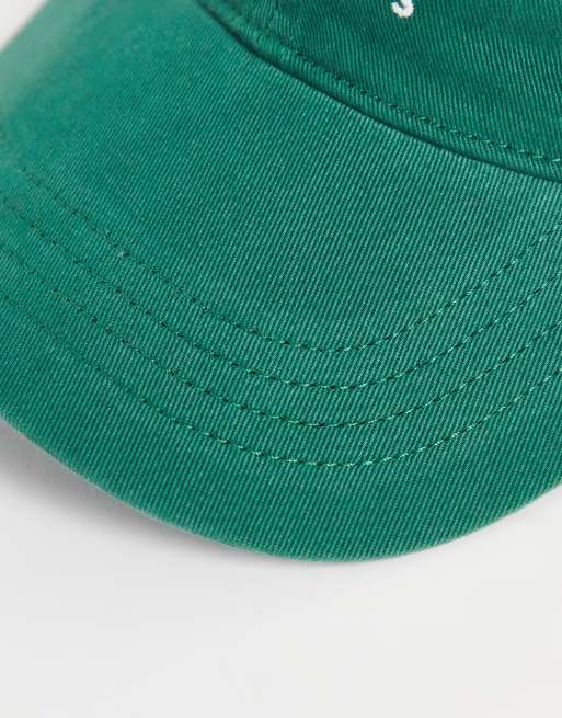 Abercrombie & Fitch cap with manhattan tennis print in green | ASOS