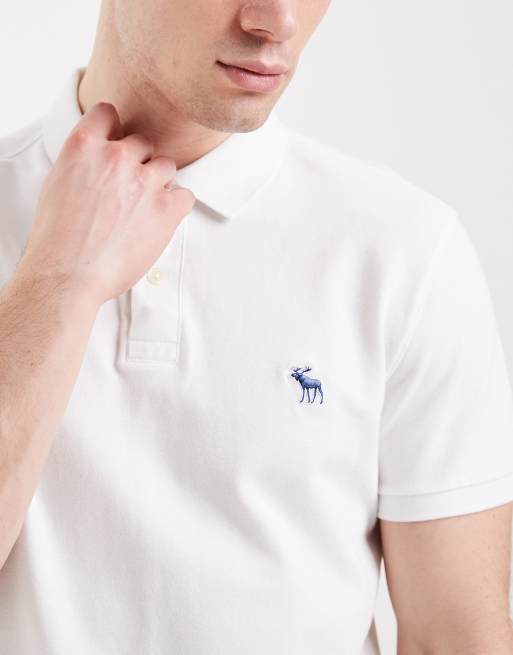 Abercrombie & Fitch - Confezione da 3 polo bianco, blu navy e nero con logo icon, 5 di 5