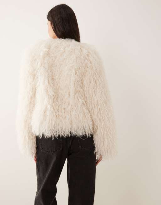 Abercrombie & Fitch cropped faux fur collarless jacket in cream | ASOS