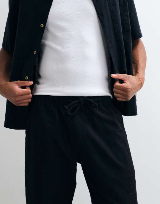 Abercrombie & Fitch – Czarne, obszerne spodnie z kory, 2 z 5