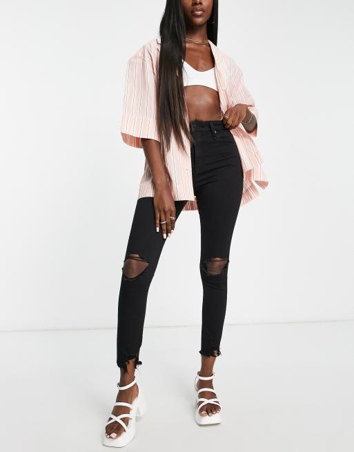 Abercrombie & Fitch - Distressed enkeljeans met hoge taille en scheur op de knieën in zwart