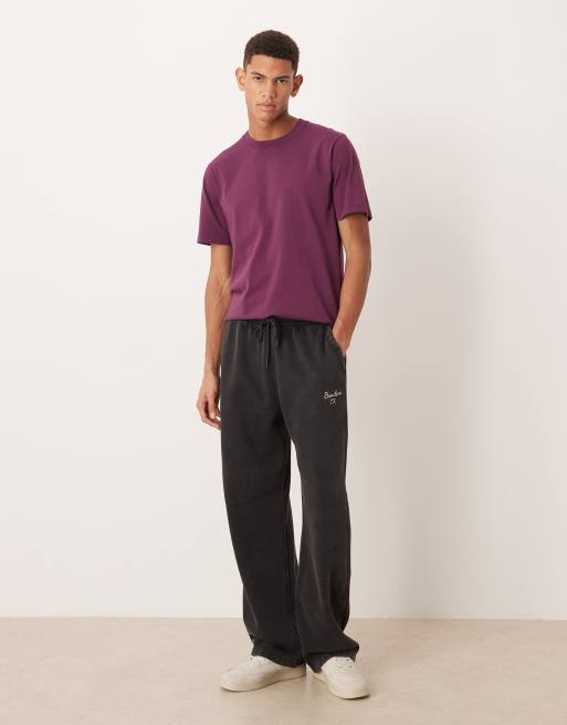 Abercrombie & Fitch - Essentials - Sorte posede joggingbukser med løstsiddende kanter og grafik, 2 af 5