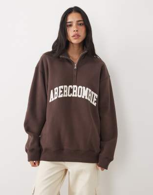 Abercrombie & Fitch front logo 1/4 zip sweatshirt in brown | ASOS