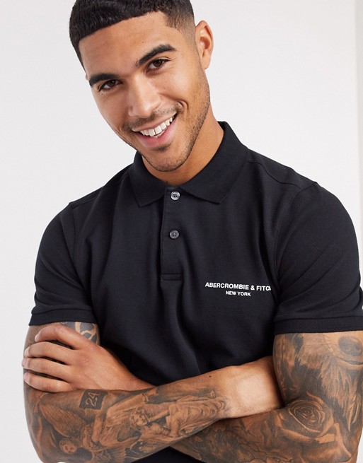 Abercrombie & Fitch graphic chest logo polo in black