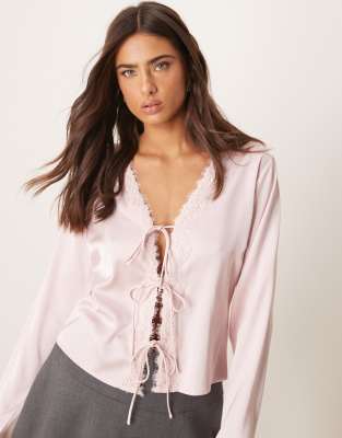 lace tie front long sleeve top in chalk pink