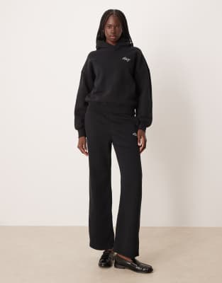 Abercrombie & Fitch - Locker geschnittene Jogginghose in Schwarz mit seitlichem Logo und hohem Bund, Kombiteil